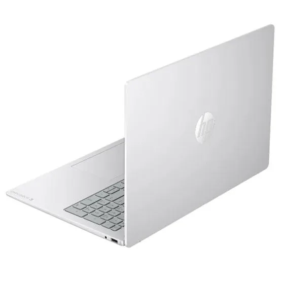 Silver 16-inch touchscreen laptop, thin profile, backlit keyboard visible