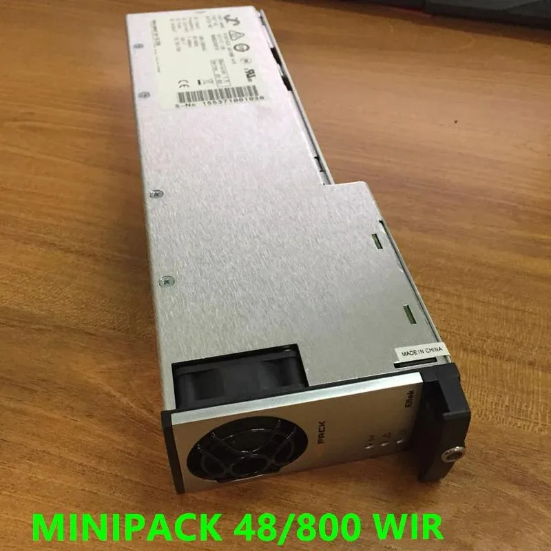 Compact rectangular ATX power supply unit in matte metal finish with ventilation grilles and rear connector panel