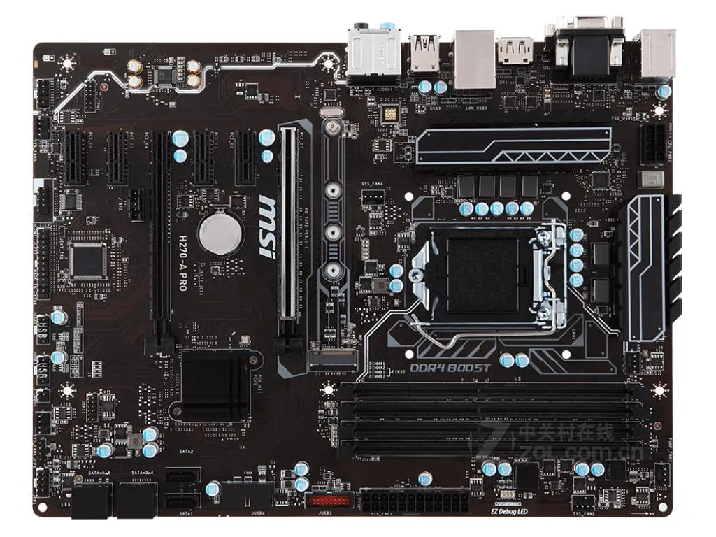 Green ATX motherboard with silver heatsinks and black slots