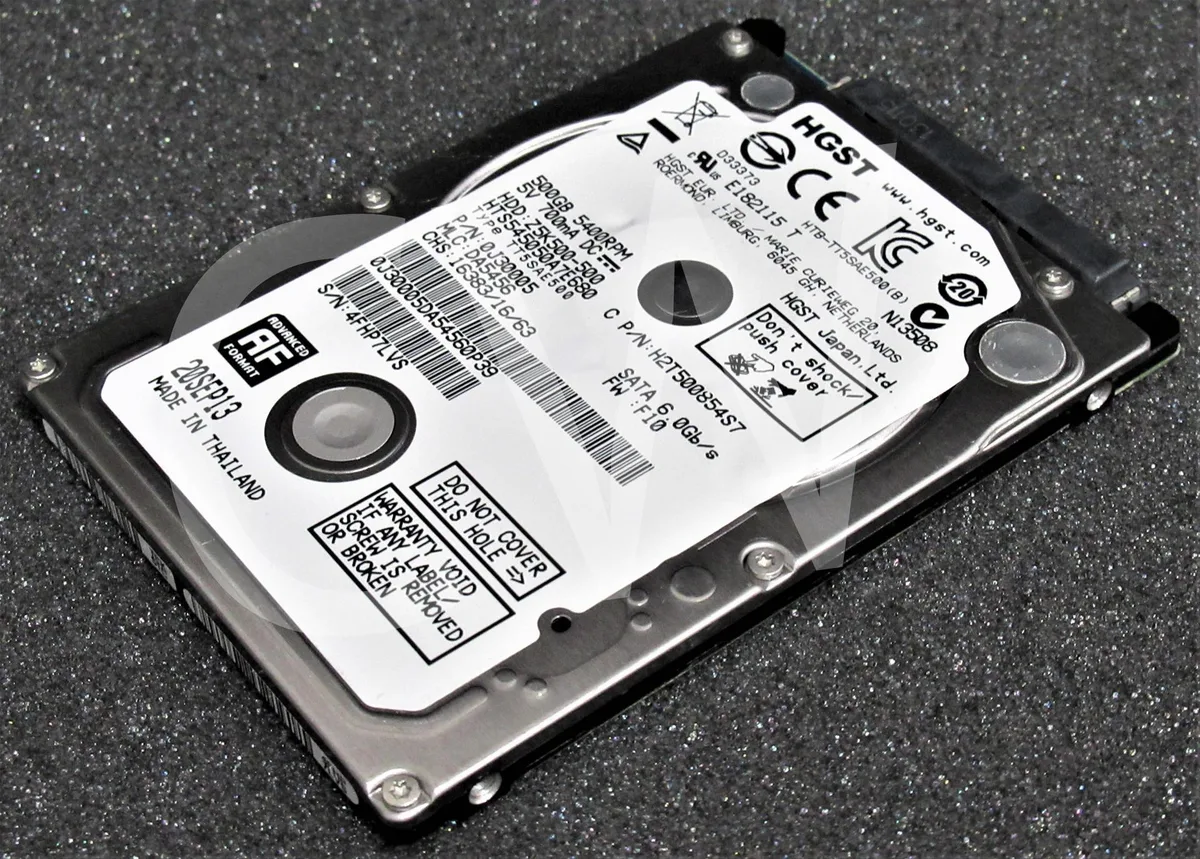 Silver 2.5 inch SATA hard drive with circuit board visible