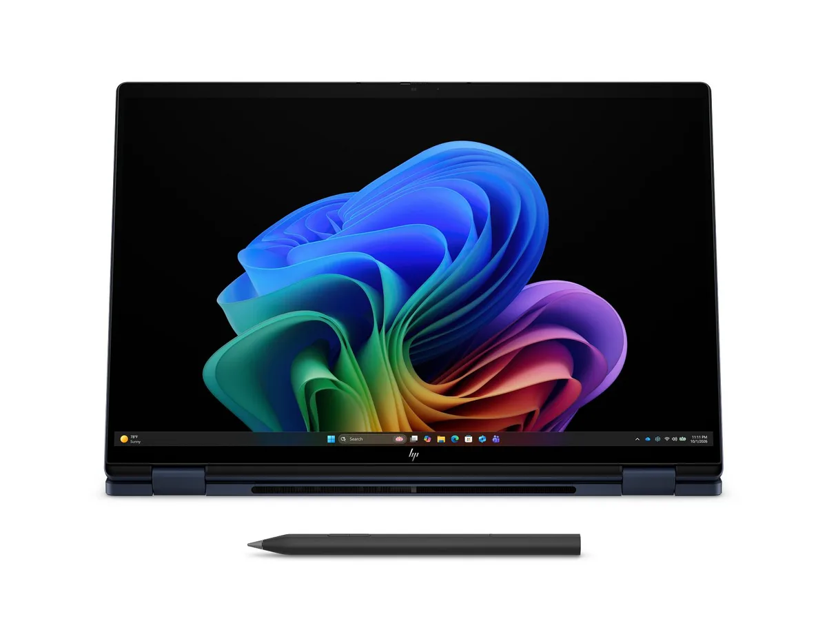 Silver 16-inch 2-in-1 laptop with edge-to-edge glass touchscreen, flexible hinge