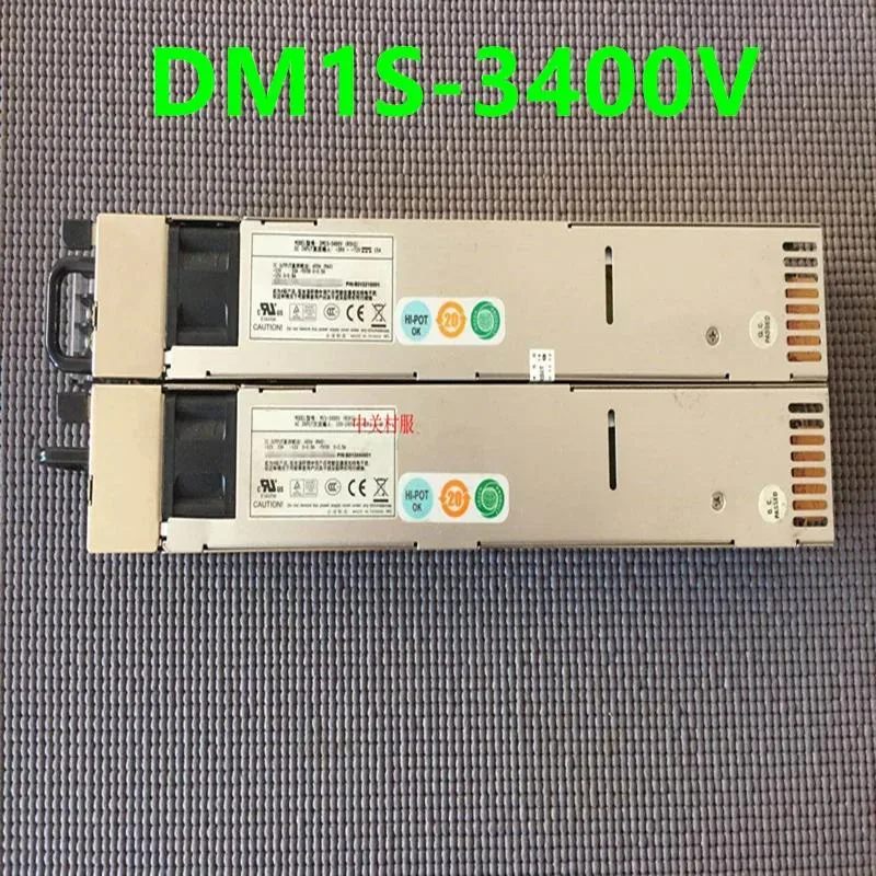 Rectangular metal ATX power supply unit with ventilation grilles and label showing 48V 400W
