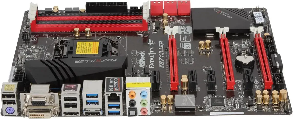 ATX motherboard with black PCB and red accents visible components include CPU socket and memory slots