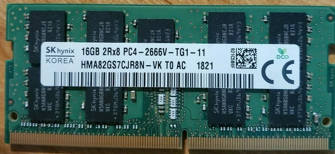 Two green SO-DIMM sticks with black chips and gold pins