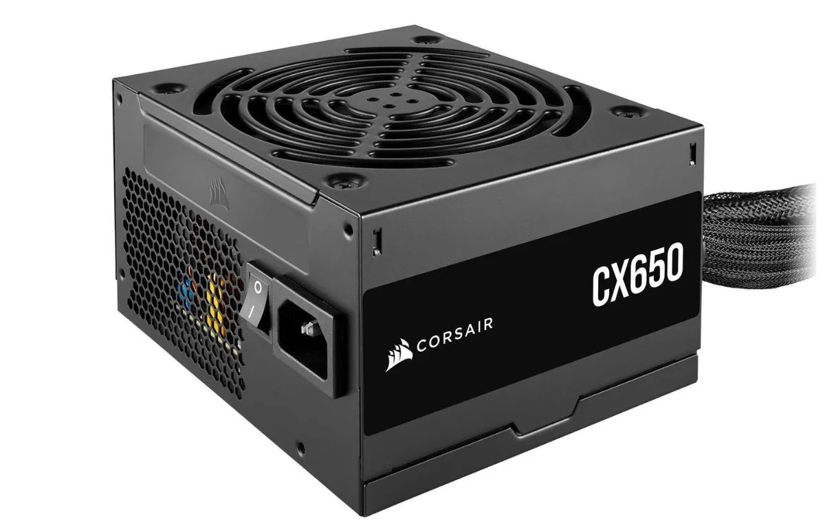 Black rectangular ATX power supply unit with 120mm fan and sleeved cables