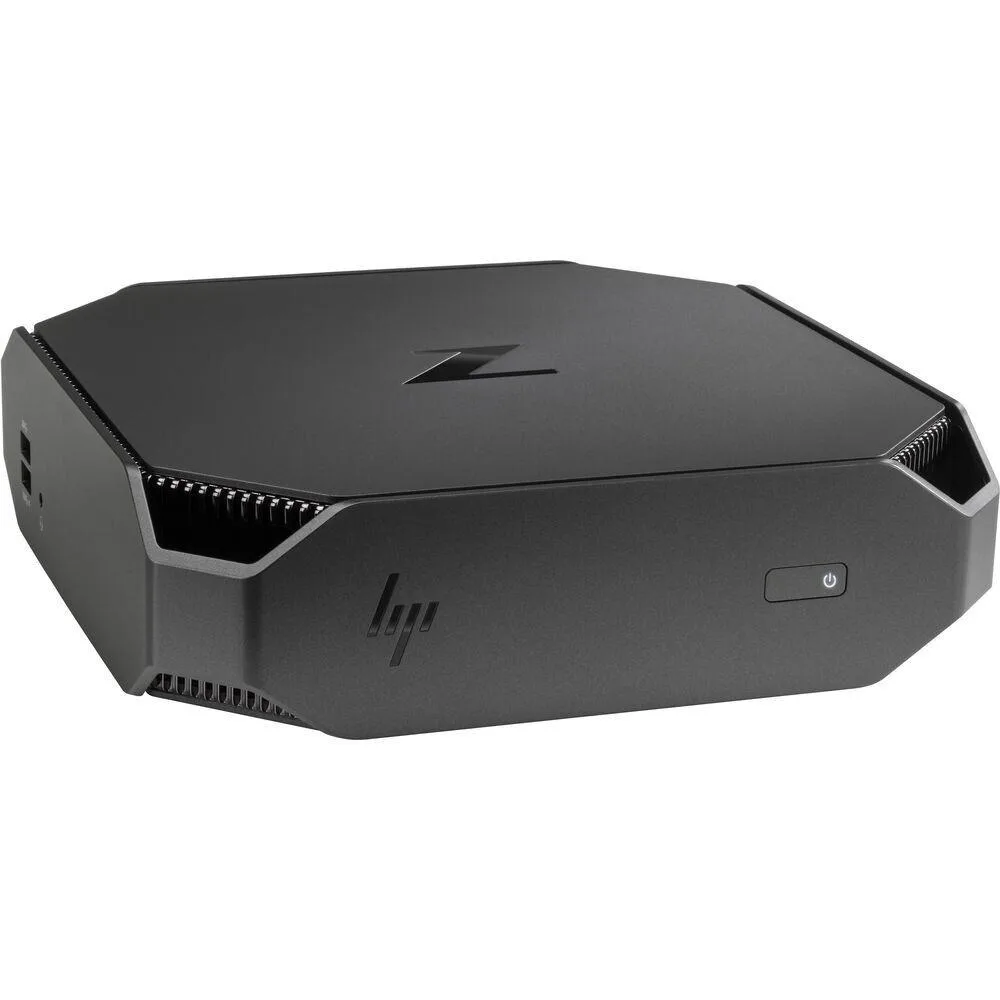 Small black mini desktop with wireless keyboard and mouse