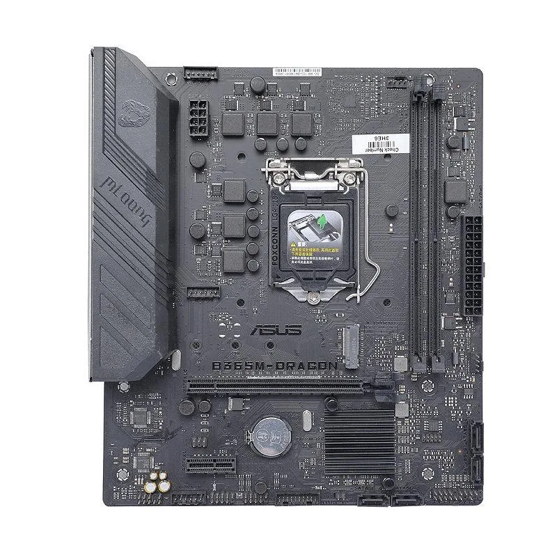 ASUS B365M-DRAGON Micro ATX motherboard black PCB silver heatsinks LGA 1151 socket DDR4 slots SATA ports I/O shield included