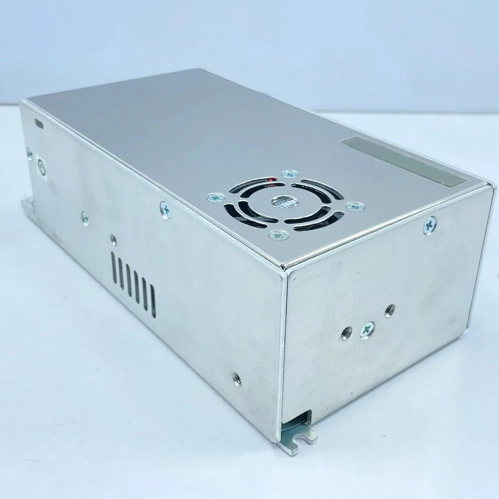 Silver metal ATX power supply unit with label