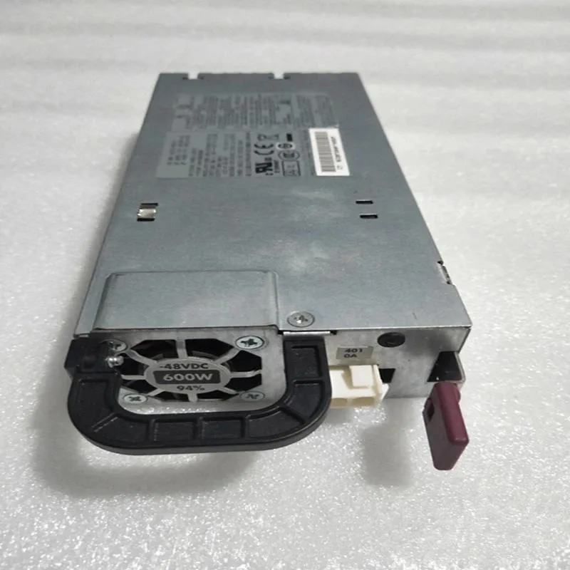 Silver rectangular ATX power supply unit with ventilation grille and label