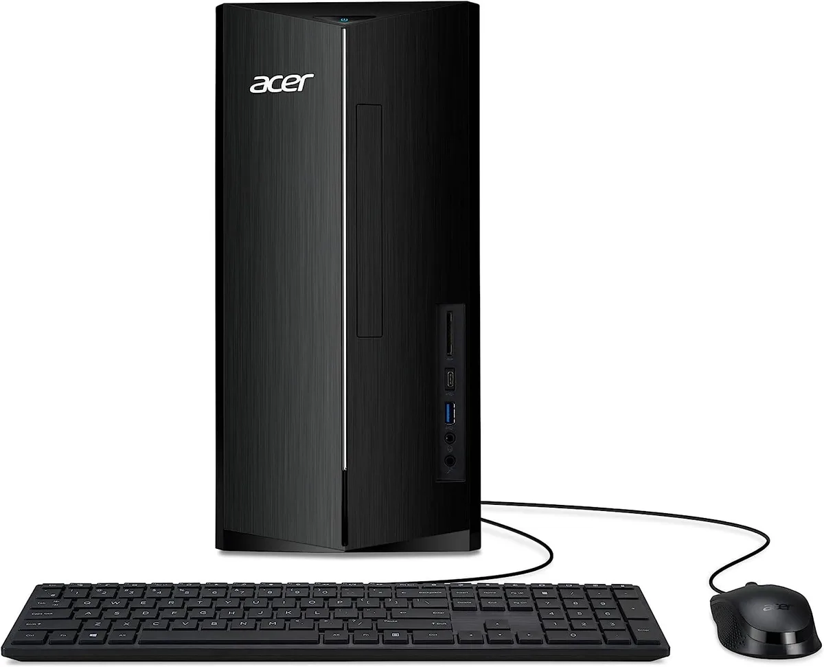 Black upright tower desktop with keyboard and mouse