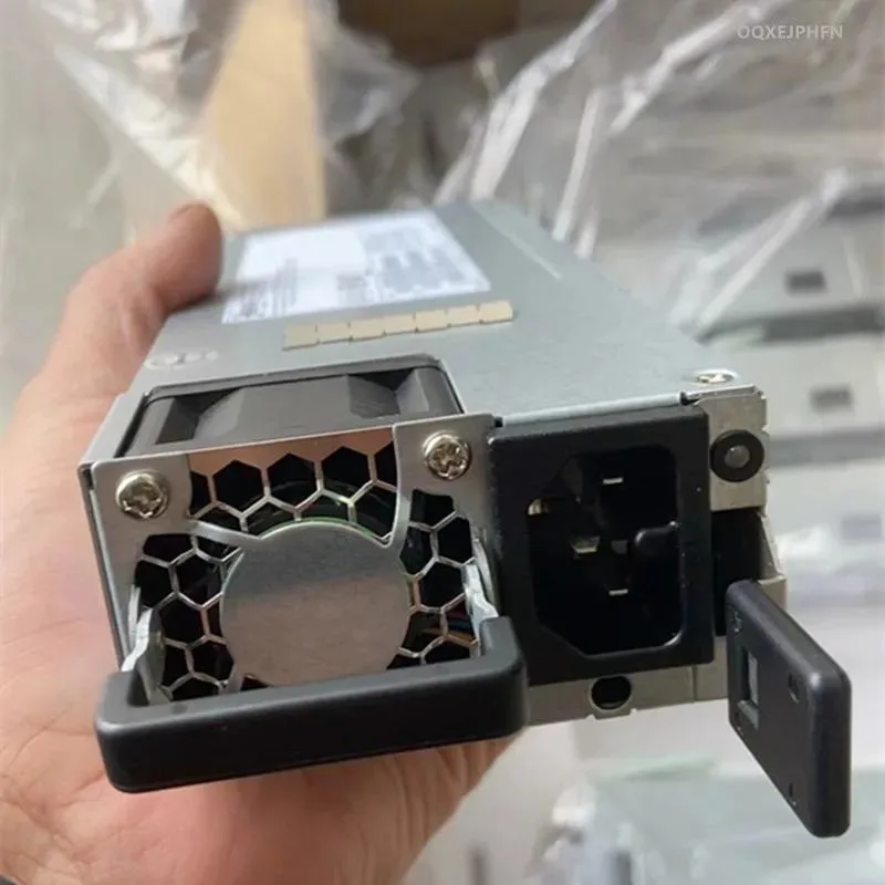 Rectangular black ATX power supply unit with cooling fan and cable connectors