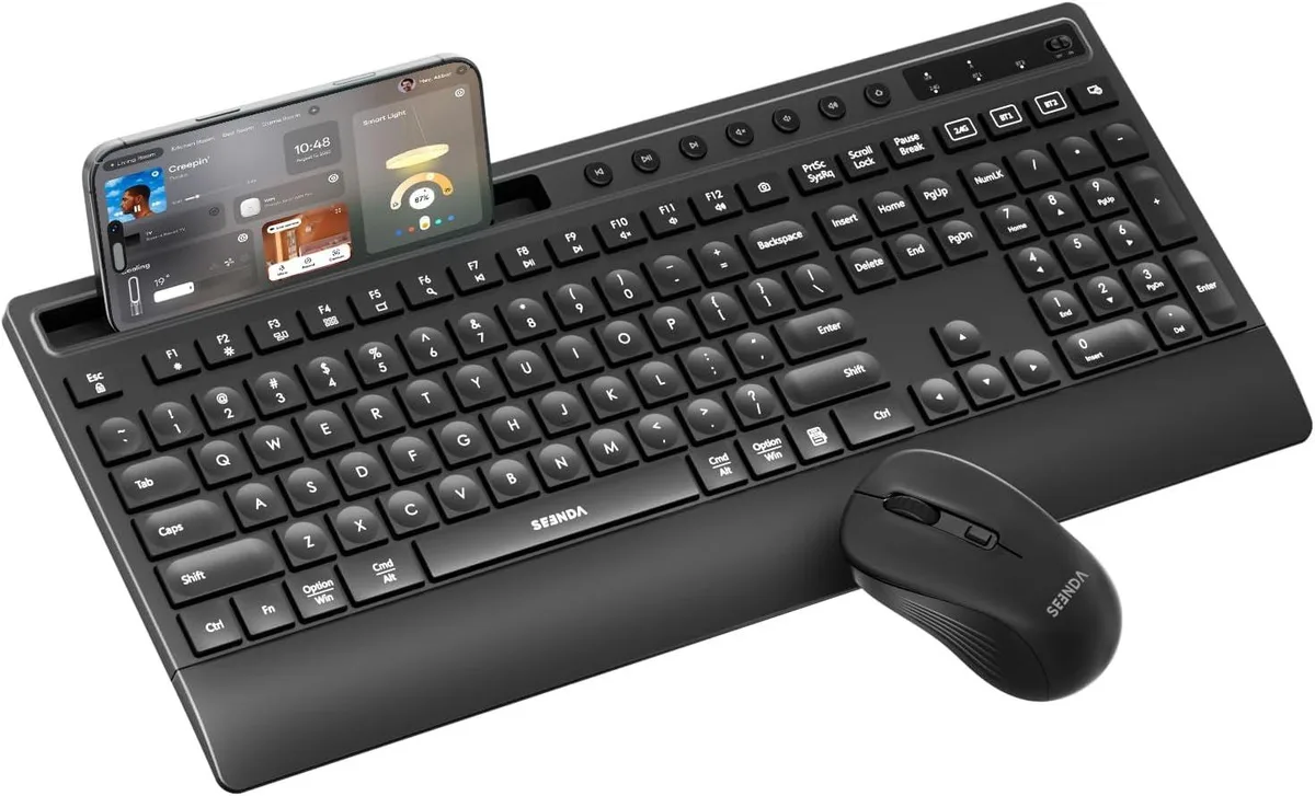 Foldable full-size keyboard and mouse in black hard case with phone holder