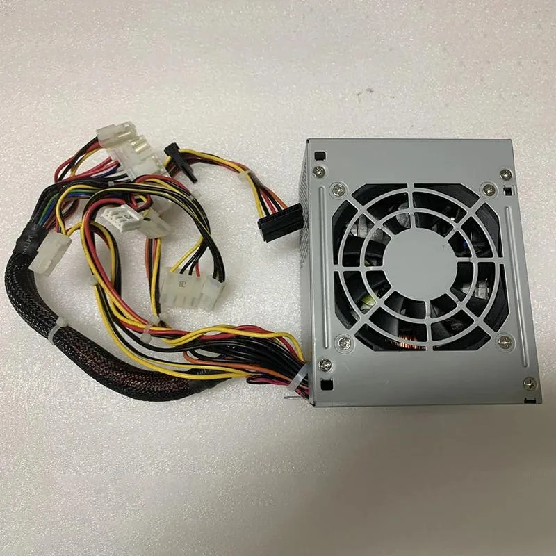Standard ATX power supply unit in black metal casing with cooling fan and cable bundle