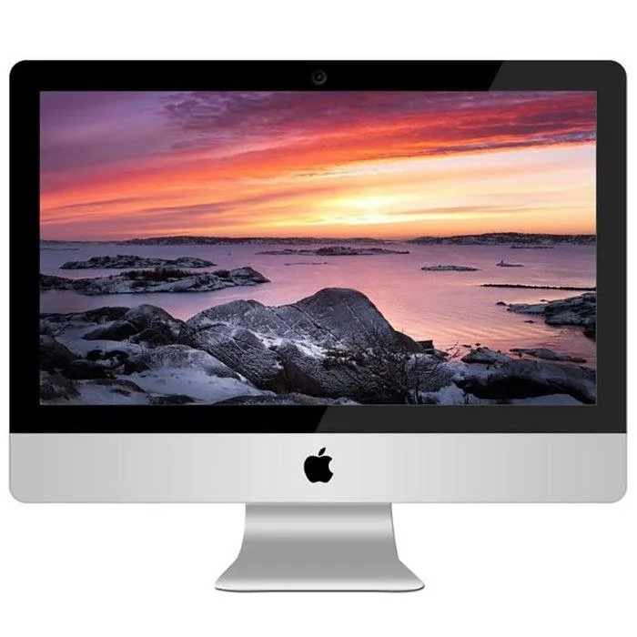 Silver all-in-one iMac with 21.5 inch display and wired keyboard and mouse