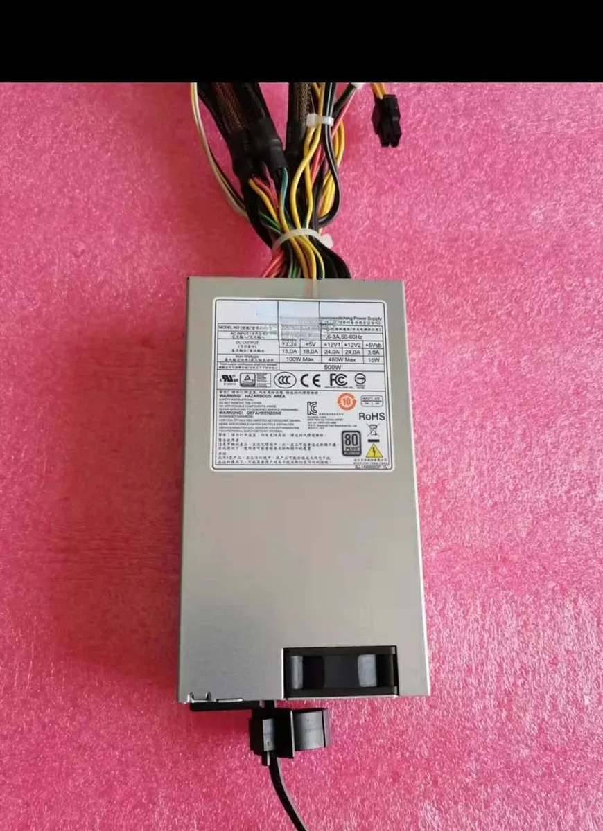 Rectangular ATX power supply unit in matte black finish with side ventilation grille and rear power socket