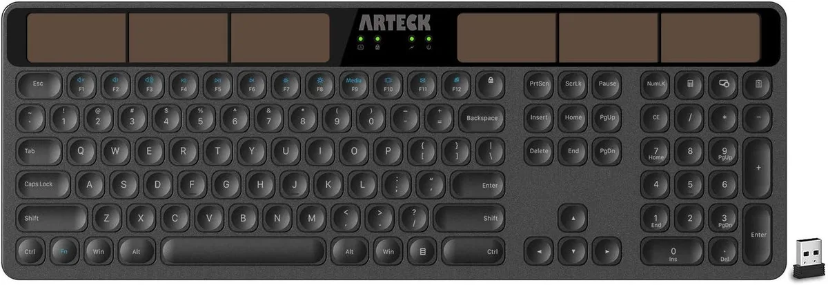 Full-size wireless keyboard with stainless metal front panel and low-profile keys