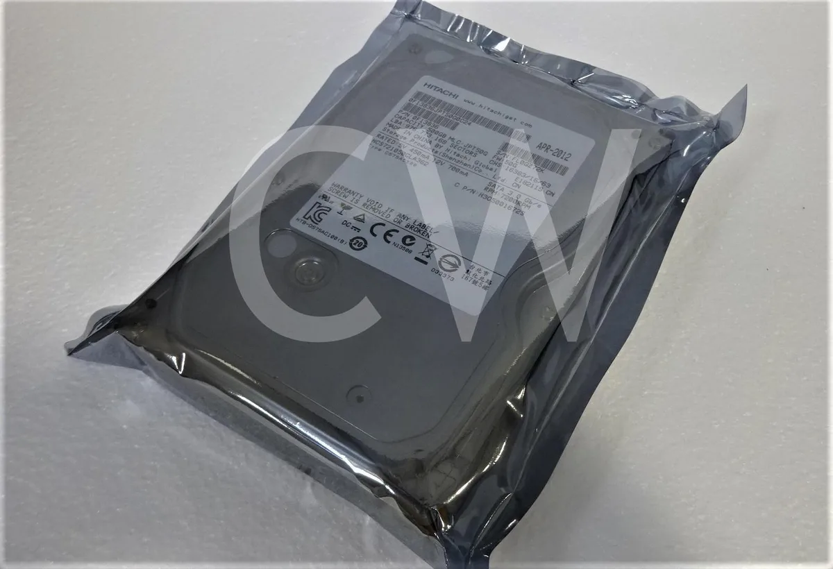Silver 3.5 inch SATA hard drive with circuit board visible
