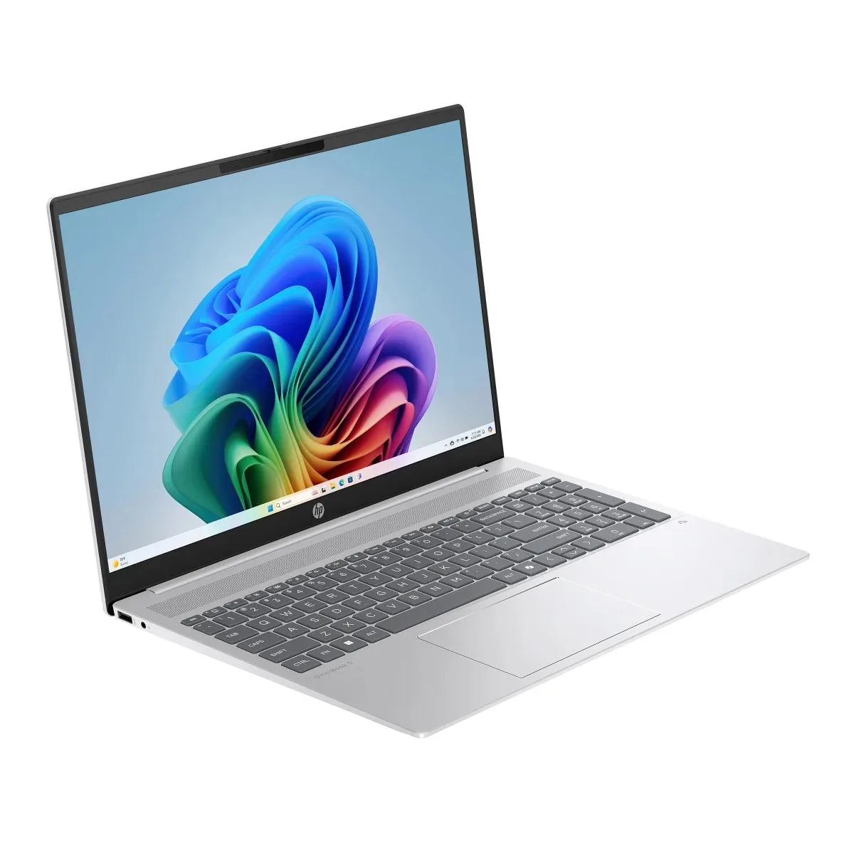 Silver 16-inch clamshell laptop with thin bezels, backlit keyboard and numeric keypad