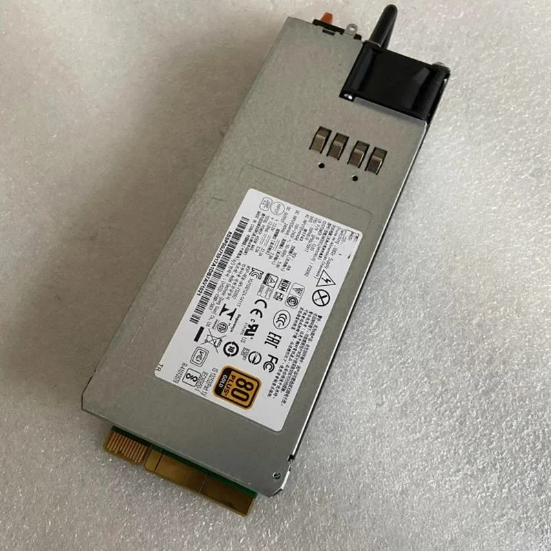 Rectangular silver ATX server power supply unit with ventilation grille and power connectors