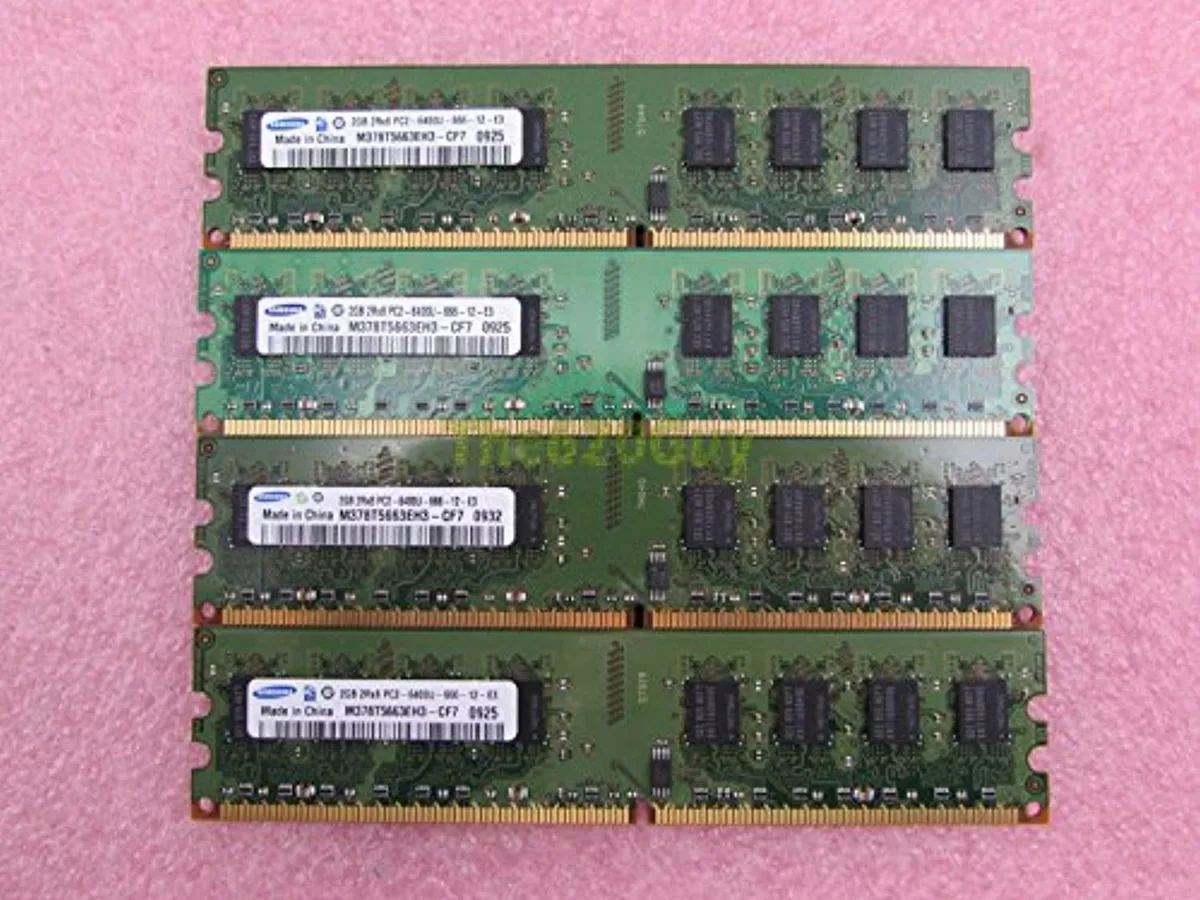 Four green DDR2 sticks with black chips and gold contacts