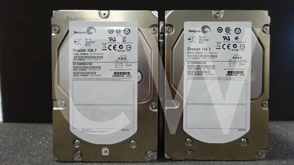 Silver 3.5 inch SAS hard drive with green circuit board visible