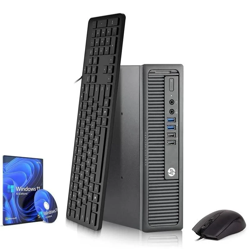 Small black desktop tower with keyboard and mouse