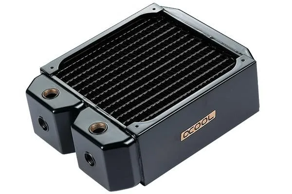Rectangular copper radiator with parallel fins and brass end tanks, shown with mounting screws and plugs