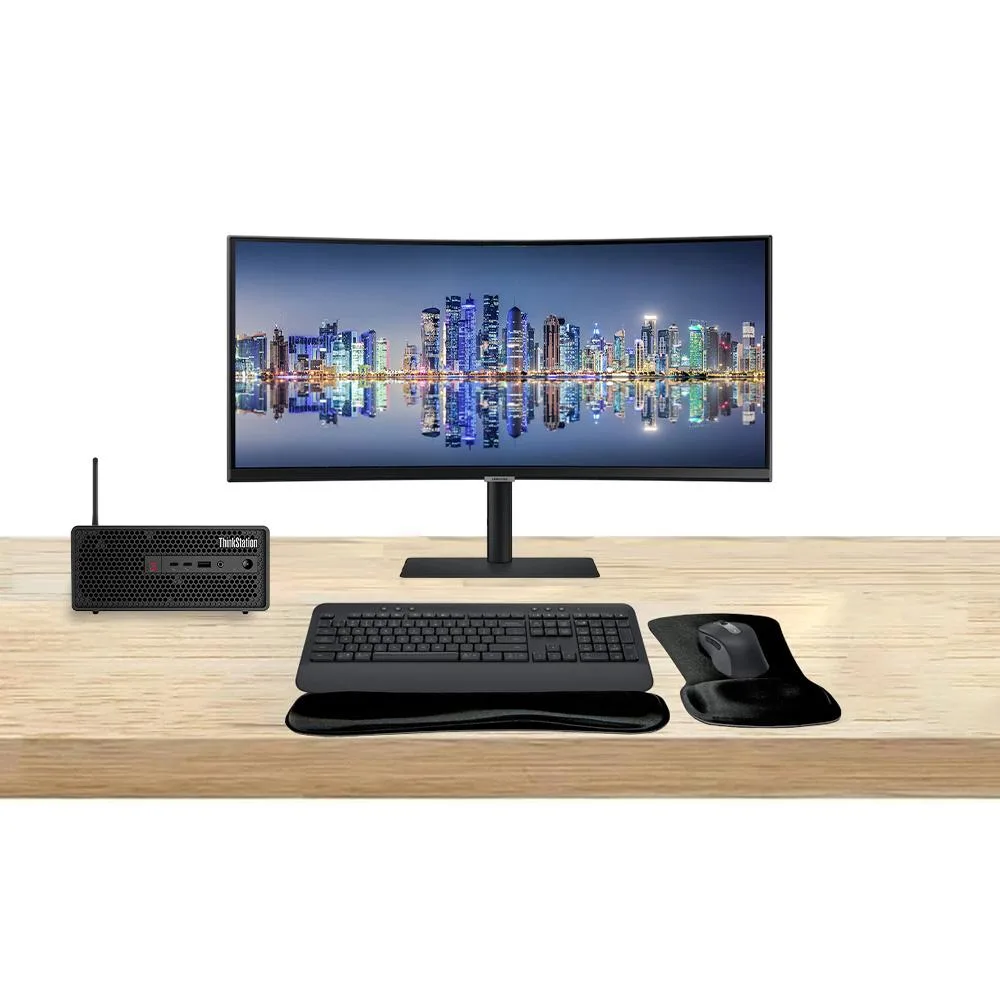 Compact black tower, 34-inch curved ultrawide monitor, graphite wireless keyboard and mouse set