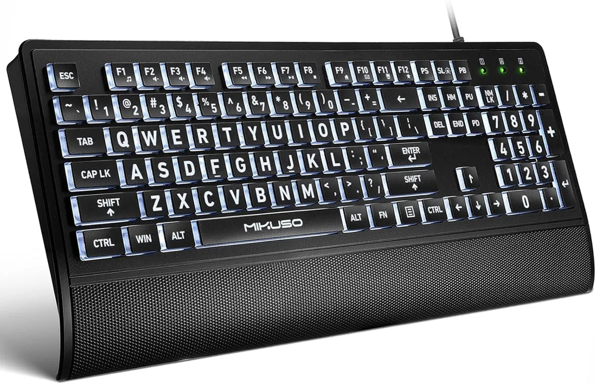 White full-size wired keyboard with large-print yellow keys and integrated wrist rest