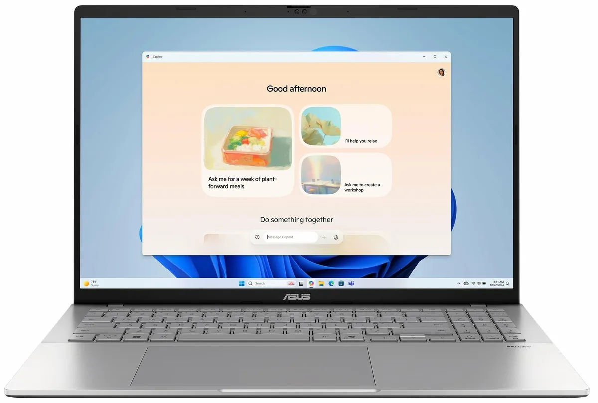 Silver 16-inch touchscreen laptop with slim profile and matte finish