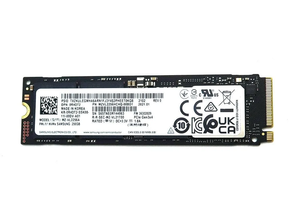 Green printed circuit board M.2 2280 SSD with black controller and silver label