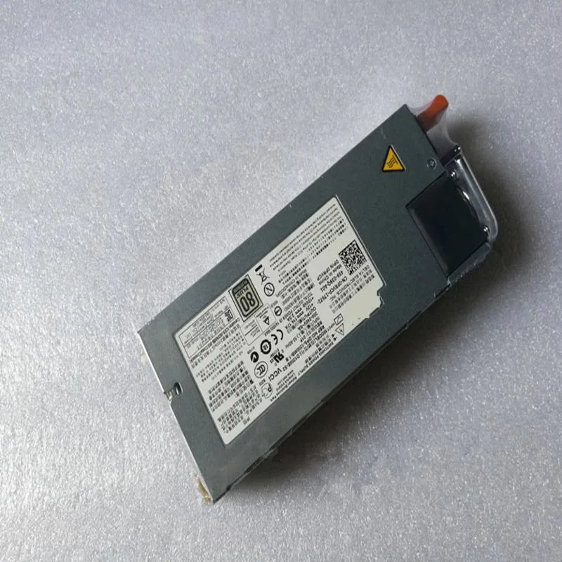 Rectangular silver ATX power supply unit with fan grille visible