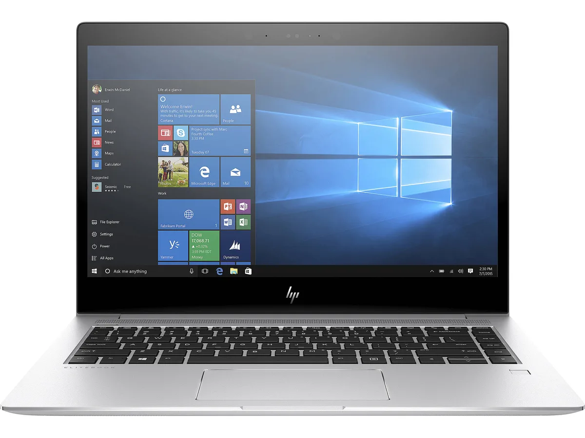 Silver 14 inch business laptop closed on flat surface