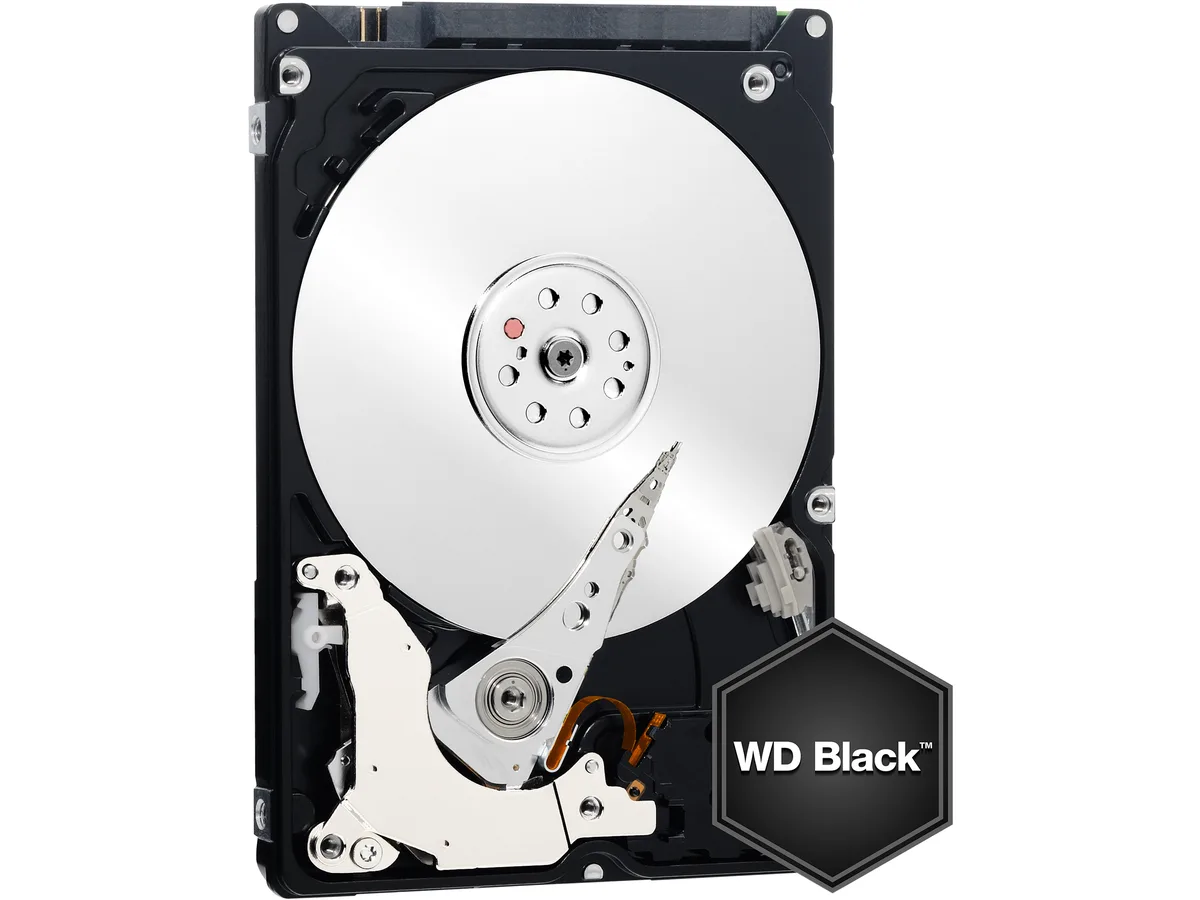 Silver 2.5 inch bare laptop hard drive with label showing Scorpio Black 320GB 7200 RPM