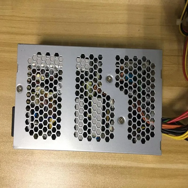 Compact 1U ATX power supply unit, matte black metal enclosure with fan grille and cable bundle