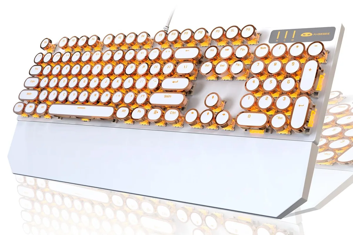 White full-size mechanical keyboard with round gold keycaps and blue switches