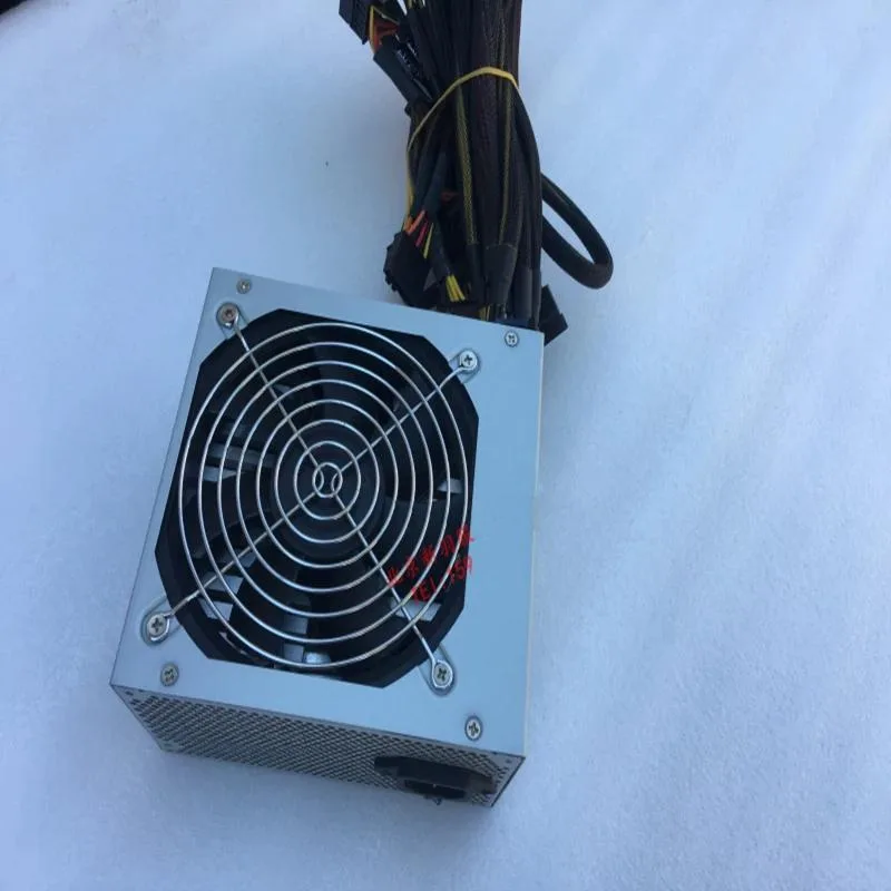 Black rectangular ATX power supply unit with cooling fan and cable bundle