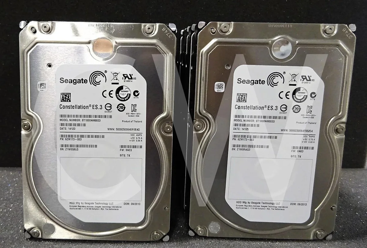 Silver 3.5 inch SATA hard drive with circuit board visible