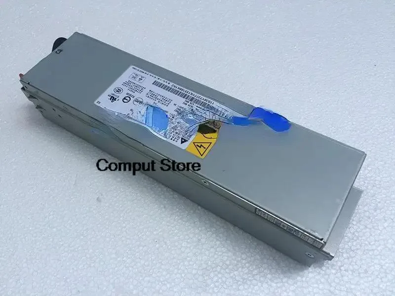 Rectangular silver server power supply unit with rear fan grille and power connector