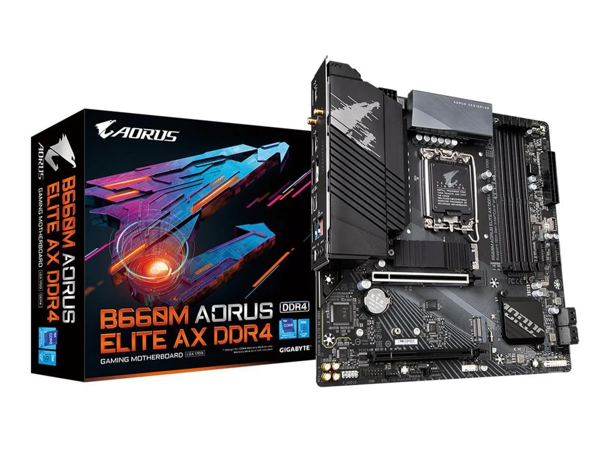 Dark grey micro-ATX board with silver heatsinks and four black DDR4 slots