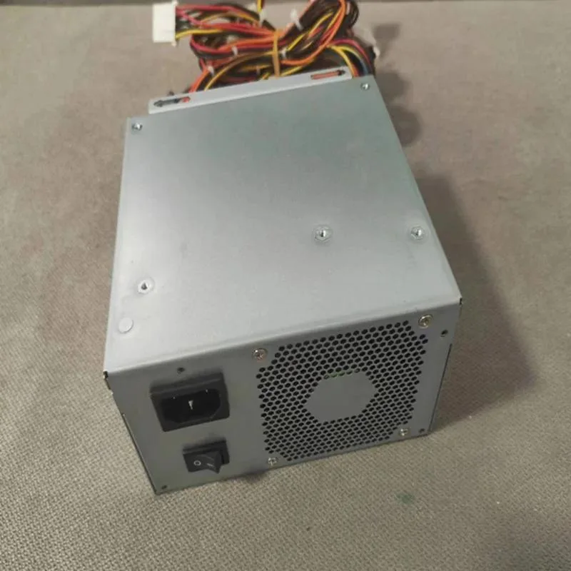Black ATX power supply unit with 12 cm fan grille and modular cable connectors