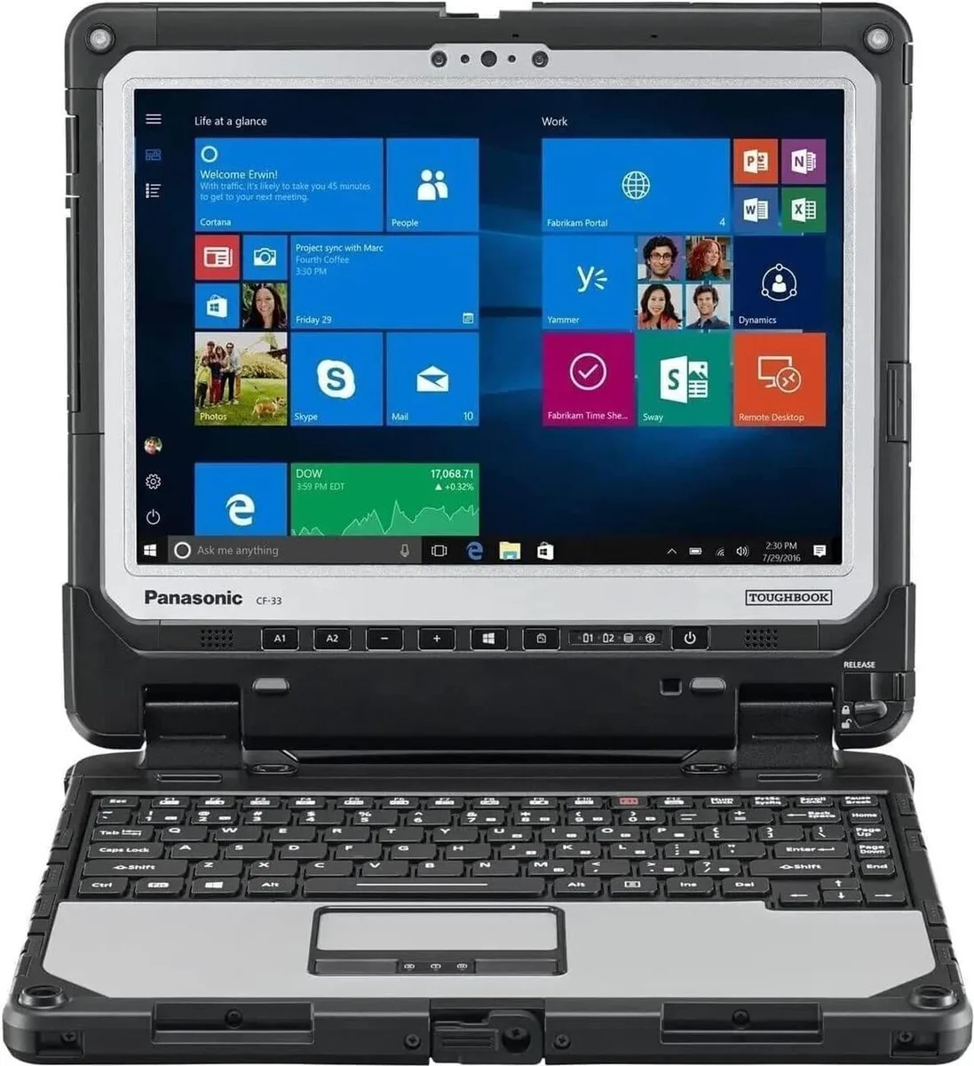 Rugged silver 12 inch detachable 2-in-1 laptop with kickstand and keyboard attached