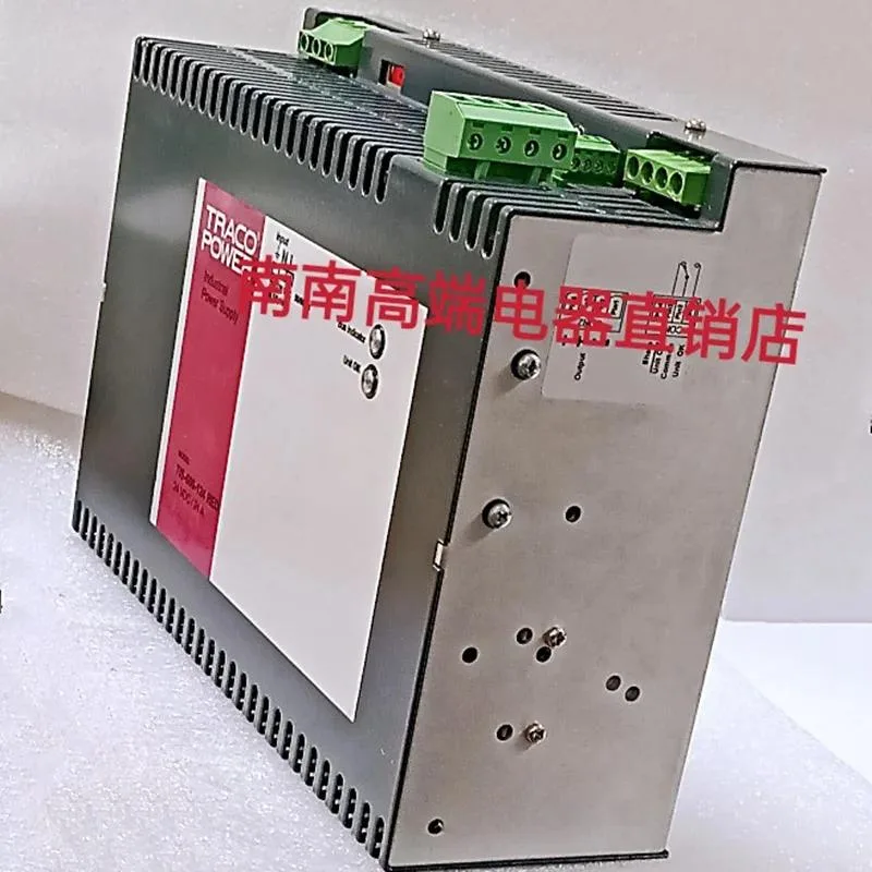 Red metal DIN rail power supply unit with front terminals and ventilation slots
