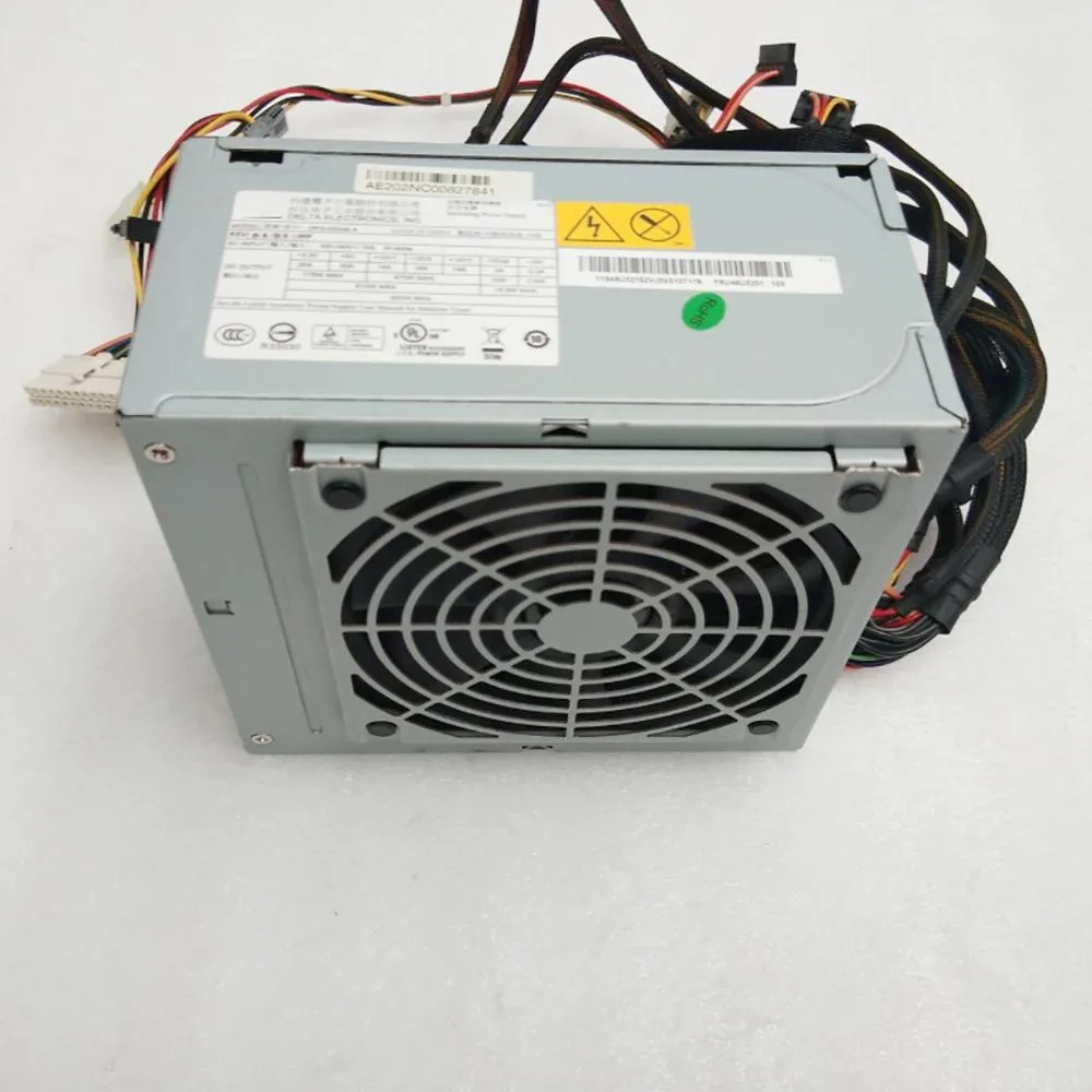 Rectangular silver ATX power supply unit with ventilation grille