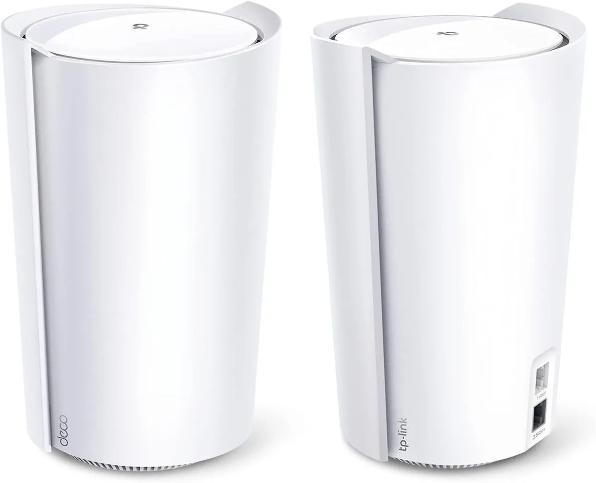Two white cylindrical mesh units with internal antennas