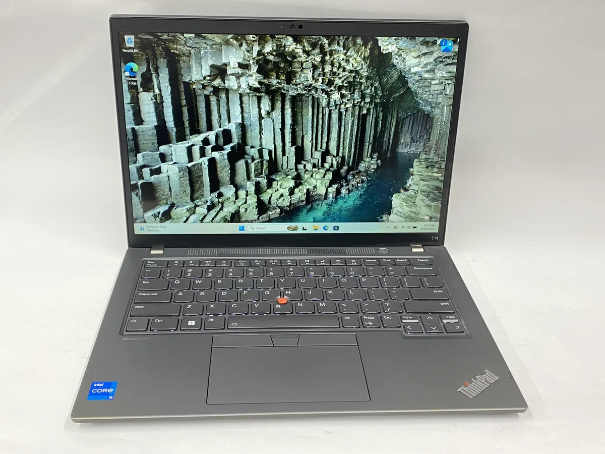 Silver Lenovo T14 laptop open showing 14 inch touchscreen display and keyboard