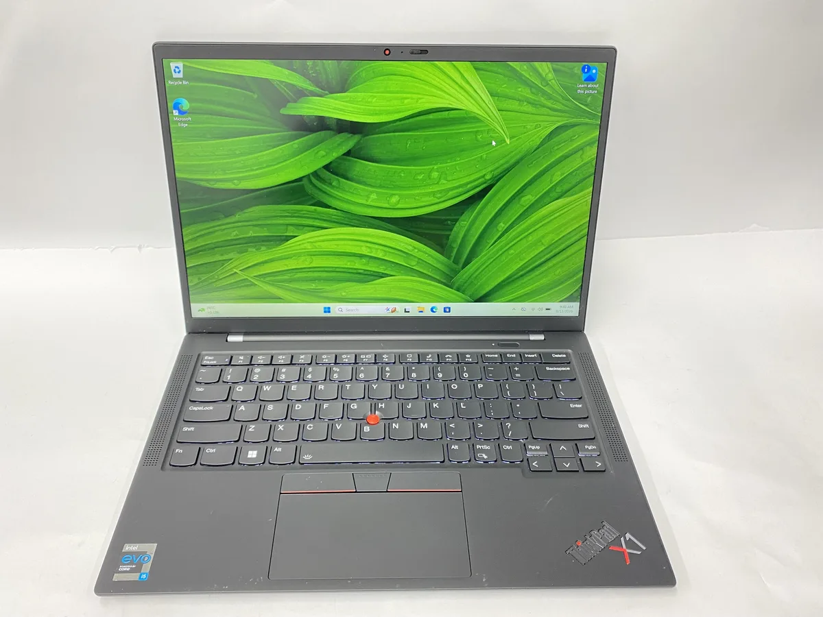 Black 14 inch laptop with matte finish, closed lid showing ThinkPad logo