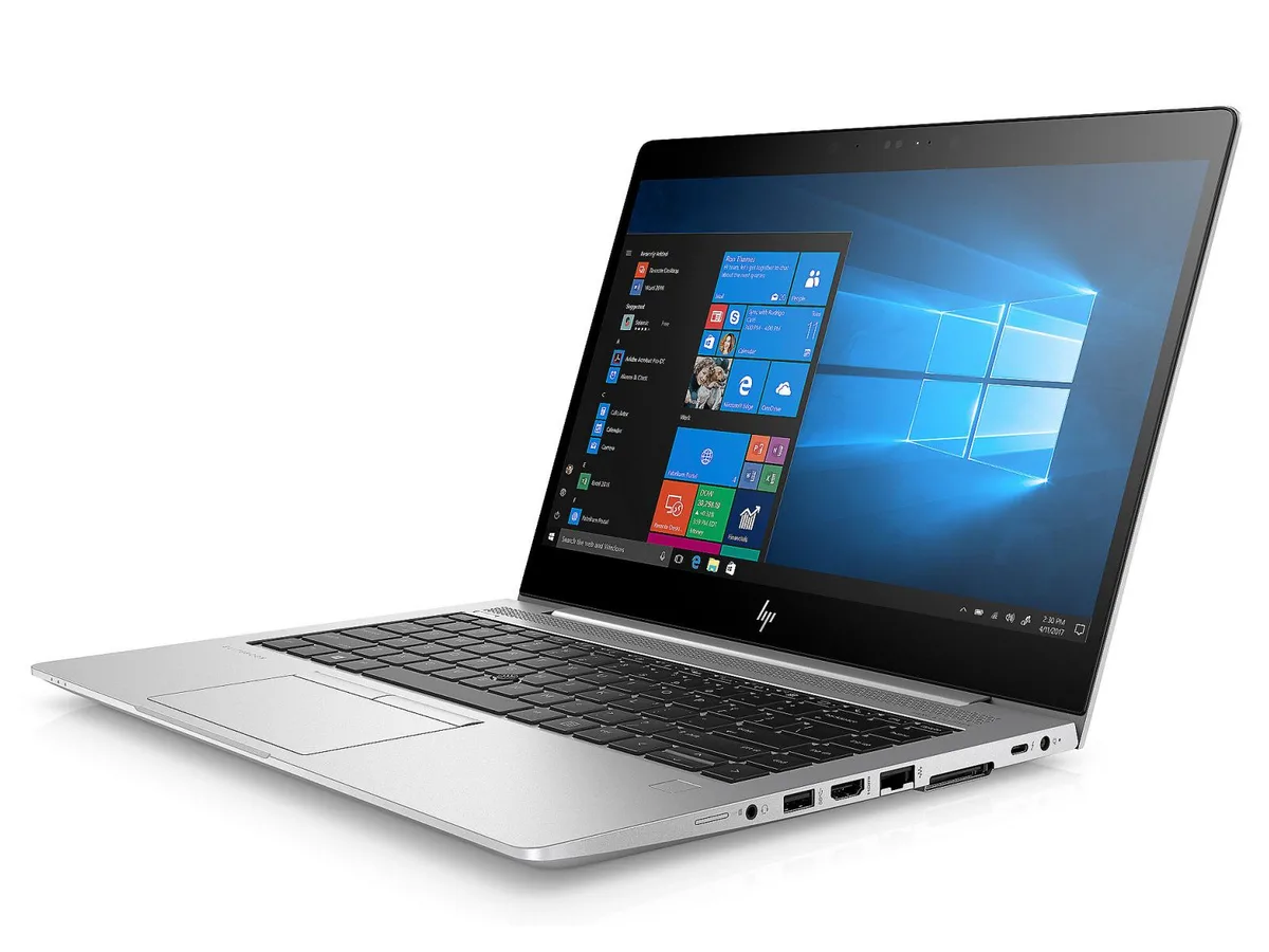 Silver 14-inch business laptop, closed lid, matte finish