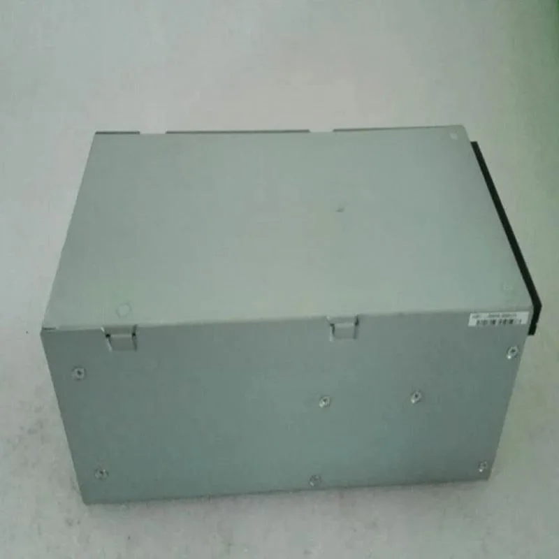 Rectangular silver ATX power supply unit with fan grille and cable bundle