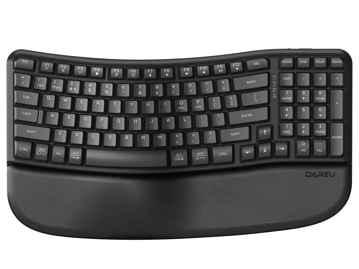 Black ergonomic split keyboard with cushioned wrist rest and wave-shaped keys